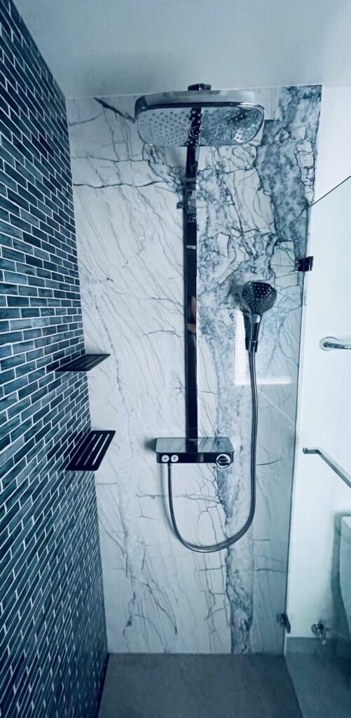 Fantasy Lux Quartzite A unique white quartzite with grey and navy veining across the surface.